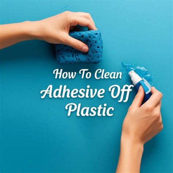 How do I remove adhesive residue from plastic?