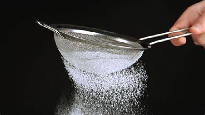 How do you dust sugar without a sifter?
