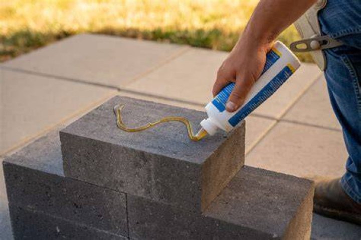 How do you remove glue from concrete block?