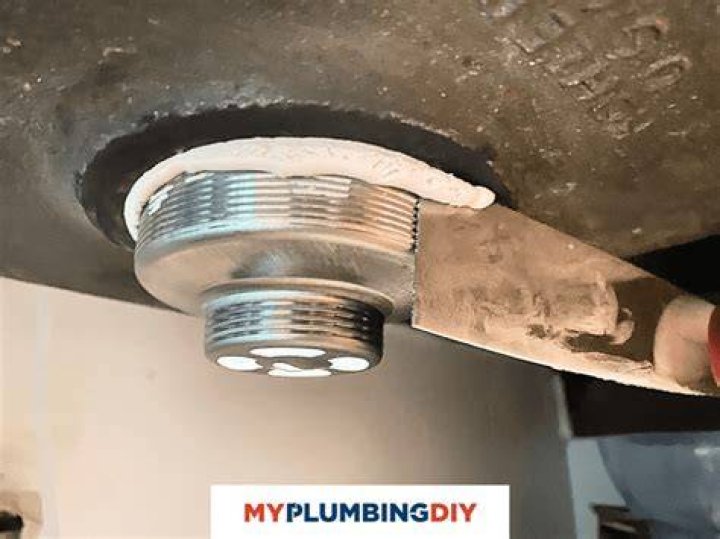 How do you remove plumbers putty from Granite