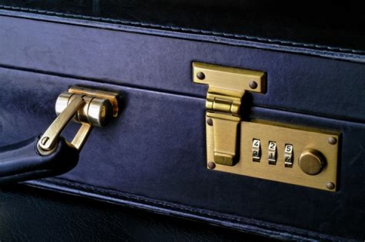 How do you reset a briefcase lock?