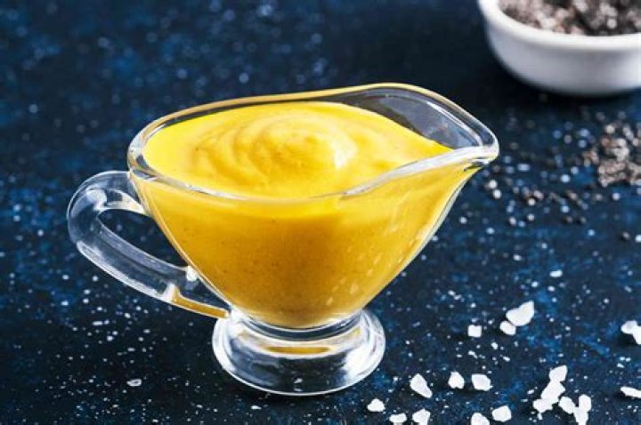 How do you stabilize cheese sauce?