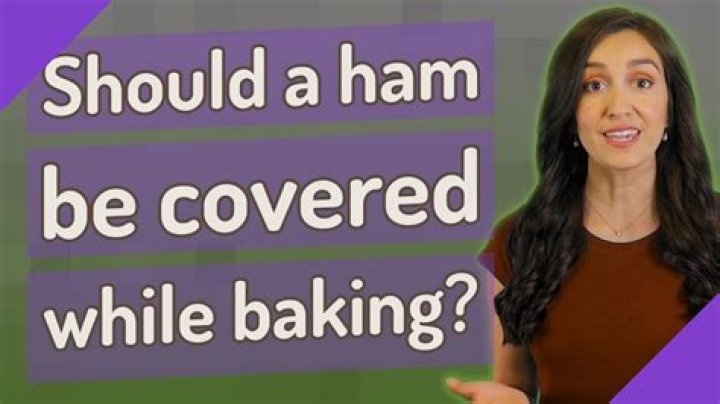 Should a ham be covered while baking?