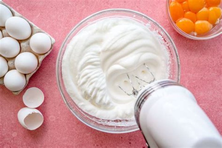 What does a beaten egg do in baking?