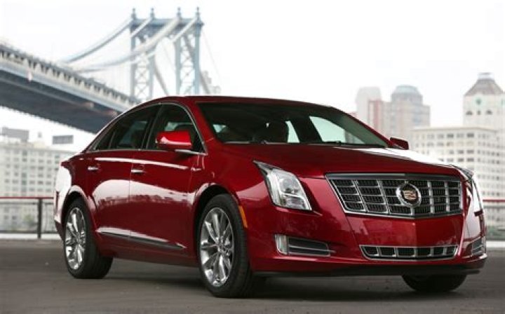 What does XTS stand for Cadillac?