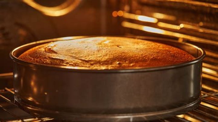 What gas is released when baking a cake?