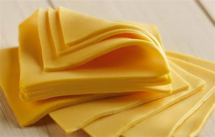 What processed cheese was created in 1928?